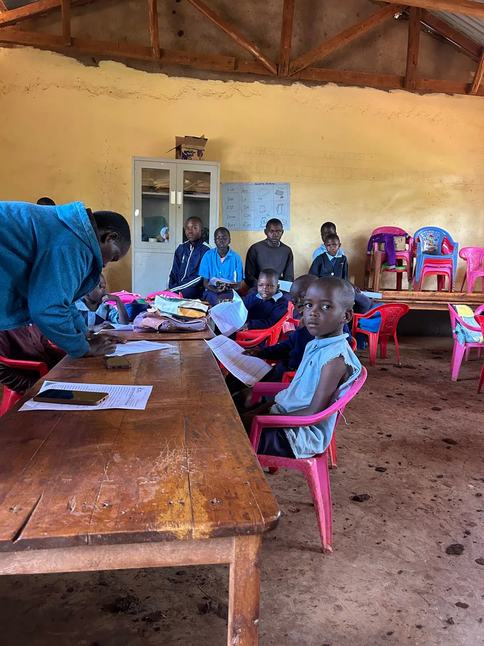 Learners being fitted for uniforms at a ZOF distribution day